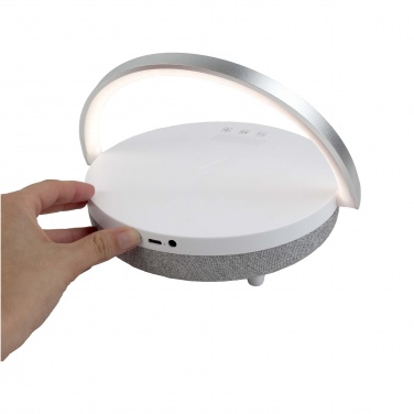 Logo trade promotional products picture of: Prixton 4-in-1 10W Bluetooth® speaker with LED light and wireless charging base